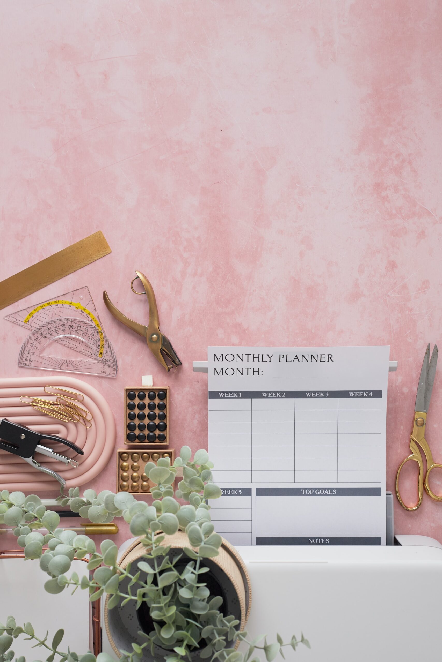 monthly planner and desk with cute stuff on it